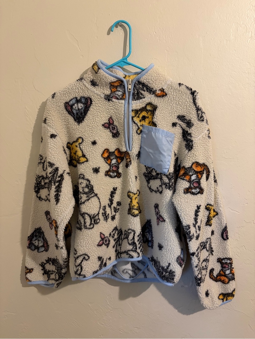 Disney Cream Sherpa Pullover with Blue Trim and Character Prints